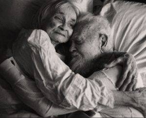 elderly caregiver embrace