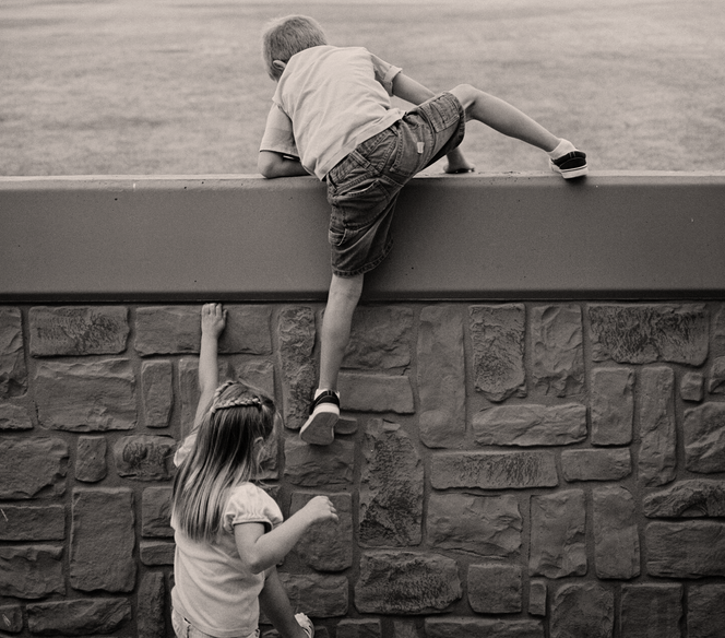 kids climbing together